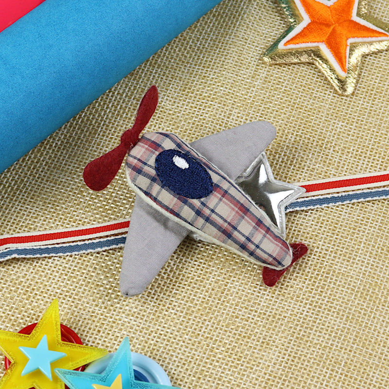 Airplane kids Rakhi, laid flat
