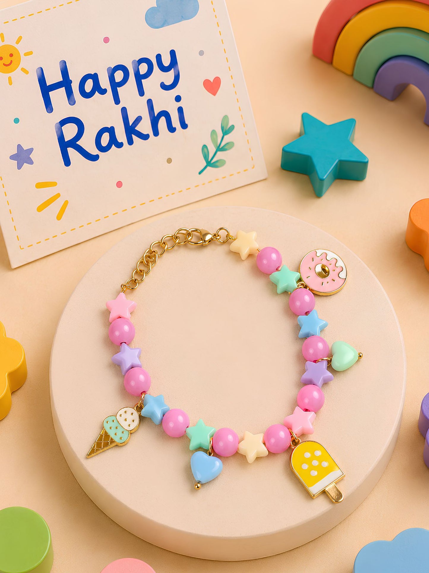 Multi-charm beaded bracelet Rakhi for girls in plastic beads and metal
