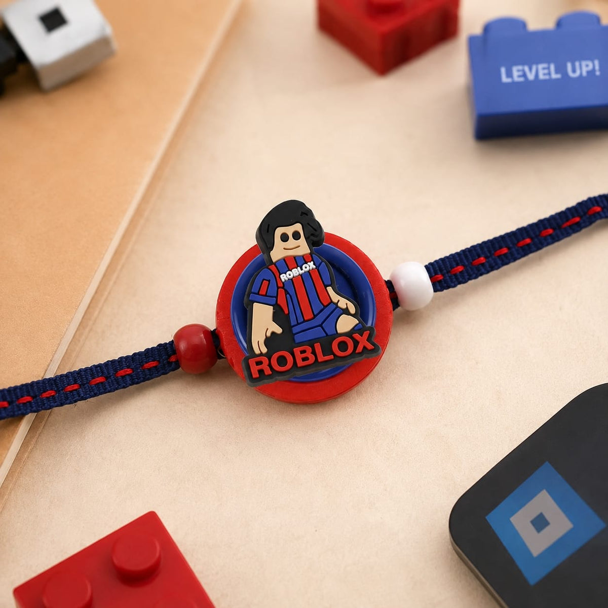 Gamer tie-up Rakhi, laid flat