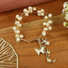 Handbeaded Pearl Butterfly Charm bracelet, laid flat