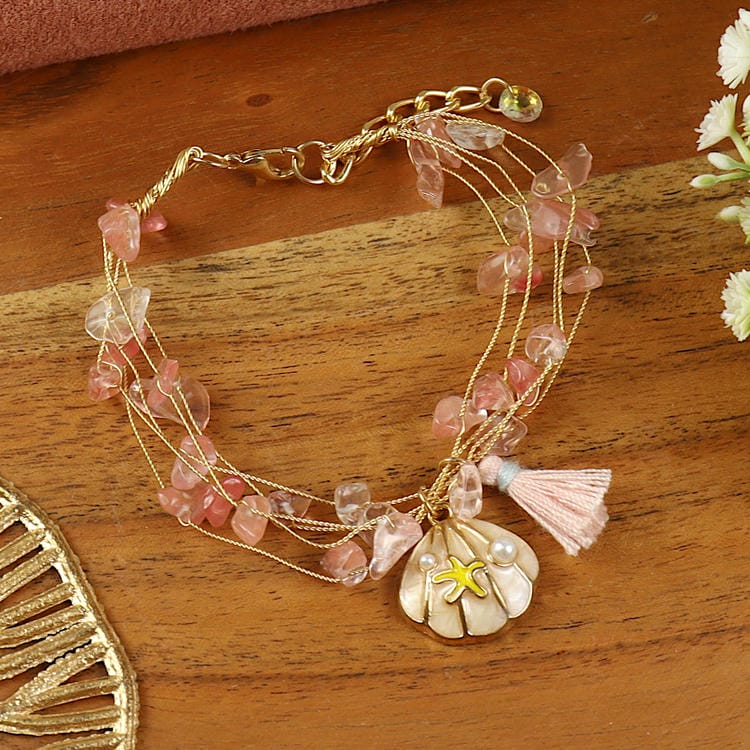 Rosequartz Hand Beaded Hanging Charm bracelet, laid flat
