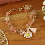 Rosequartz Hand Beaded Hanging Charm bracelet, laid flat