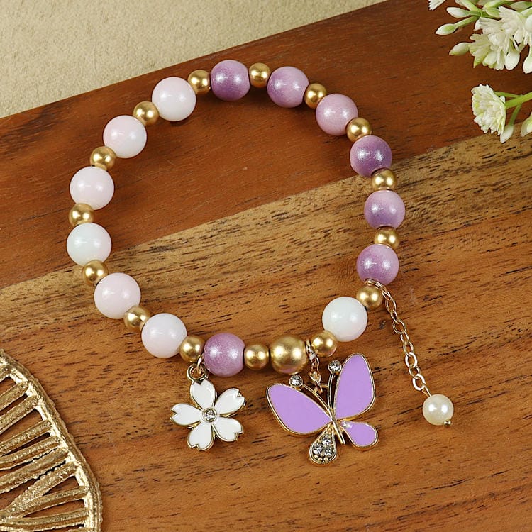 Handwoven Butterfly Evil Eye bracelet, laid flat