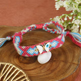 Coral Elephant Flower bracelet, laid flat