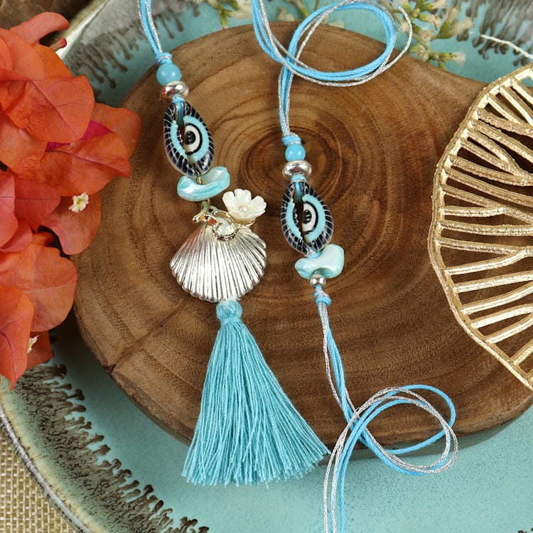 Evil Eye Golden Metallic Shell Bhaiya Bhabhi Rakhi Pair