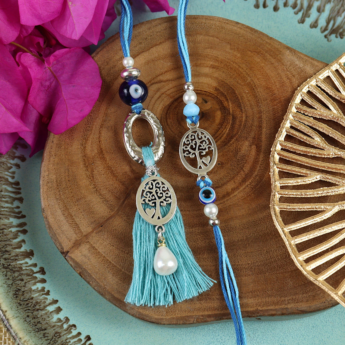 Evil Eye Tree Of Life Bhai Bhabhi Rakhi pair — Rakhi and Lumba laid flat