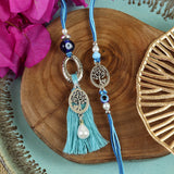 Evil Eye Tree Of Life Bhai Bhabhi Rakhi pair — Rakhi and Lumba laid flat