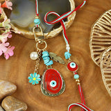 Evil Eye Floral Hanging Charm Bhai Bhabhi Rakhi Pair – Festive Rakhi Design for Raksha Bandhan