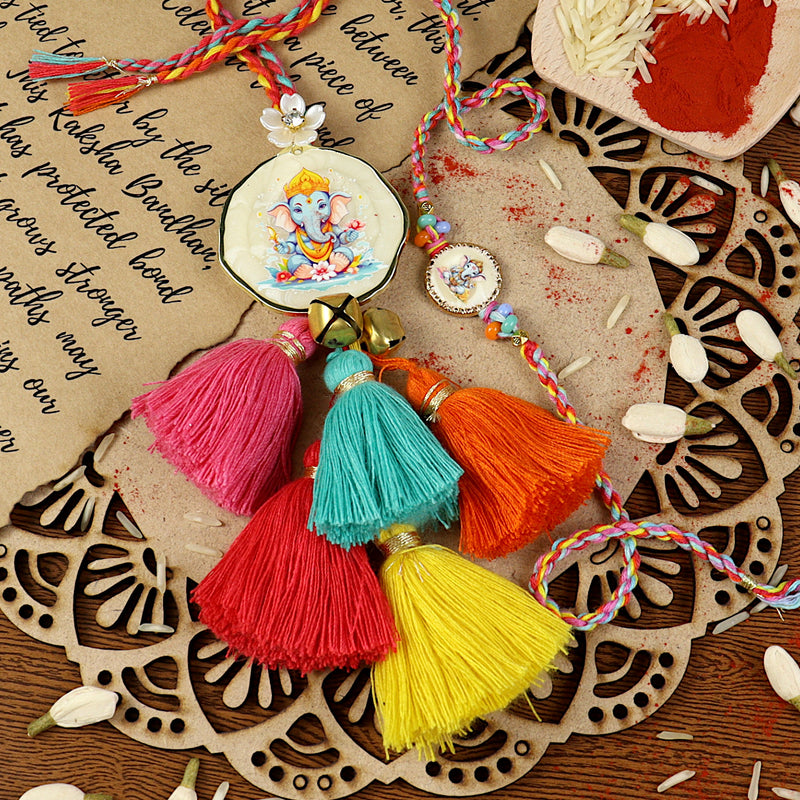 Ganpati Multi-Tassel Bhai Bhabhi Rakhi pair — Rakhi and Lumba laid flat