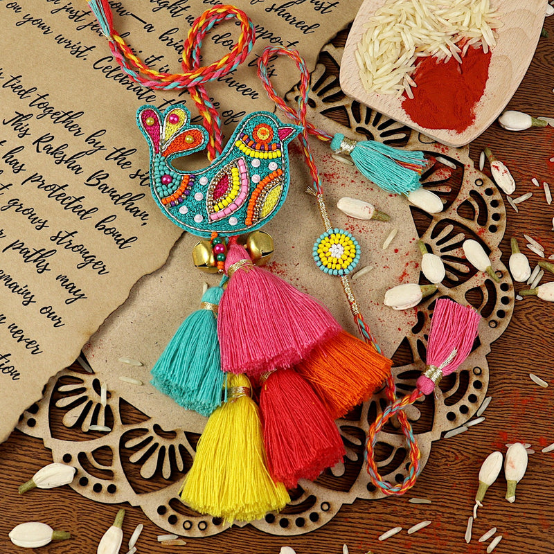 Beaded Bird Bhai Bhabhi Rakhi pair — Rakhi and Lumba laid flat