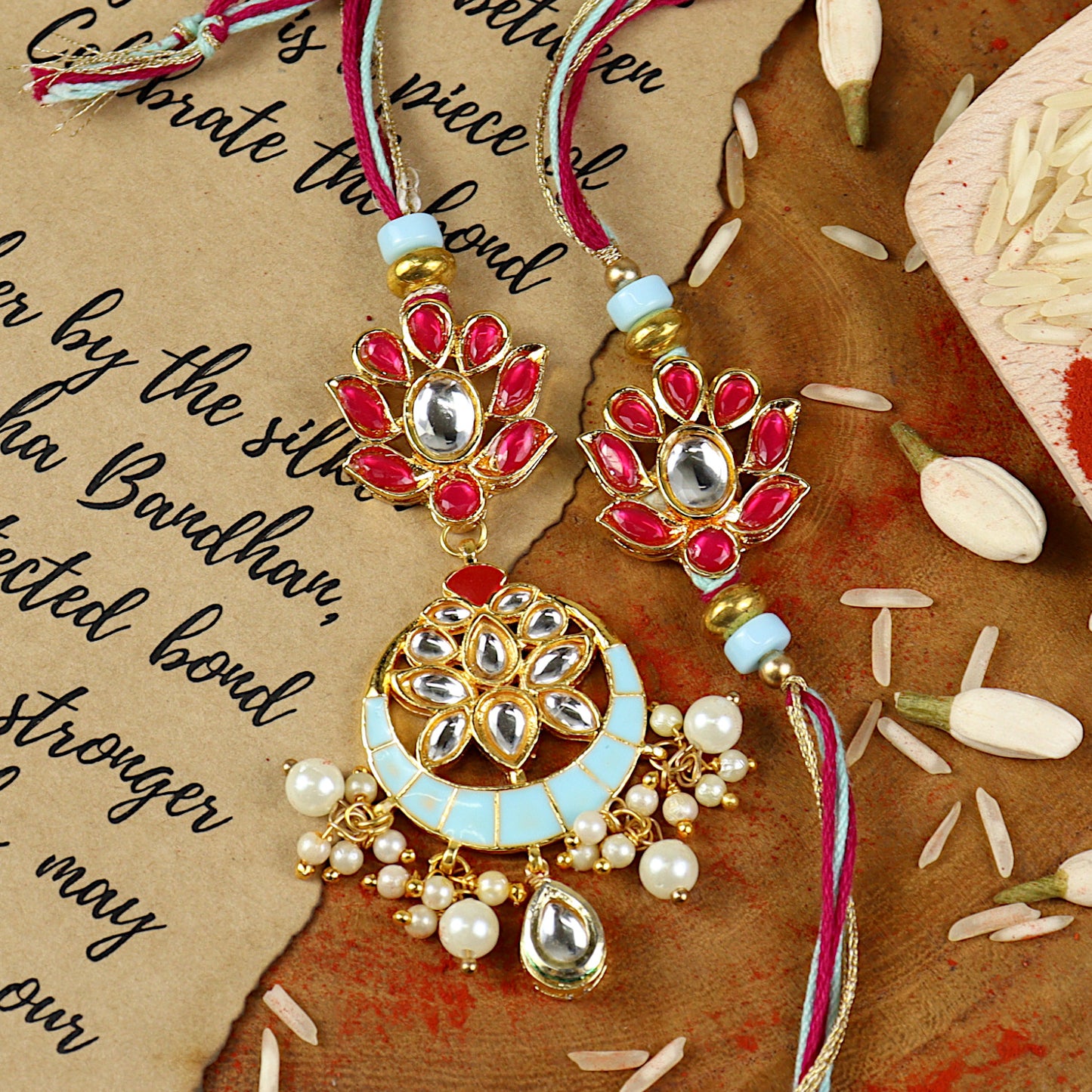 Meena Kundan Bhai Bhabhi Rakhi pair — Rakhi and Lumba laid flat