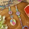 Evil Eye Oxidized Lotus Bhai Bhabhi Rakhi pair — Rakhi and Lumba laid flat