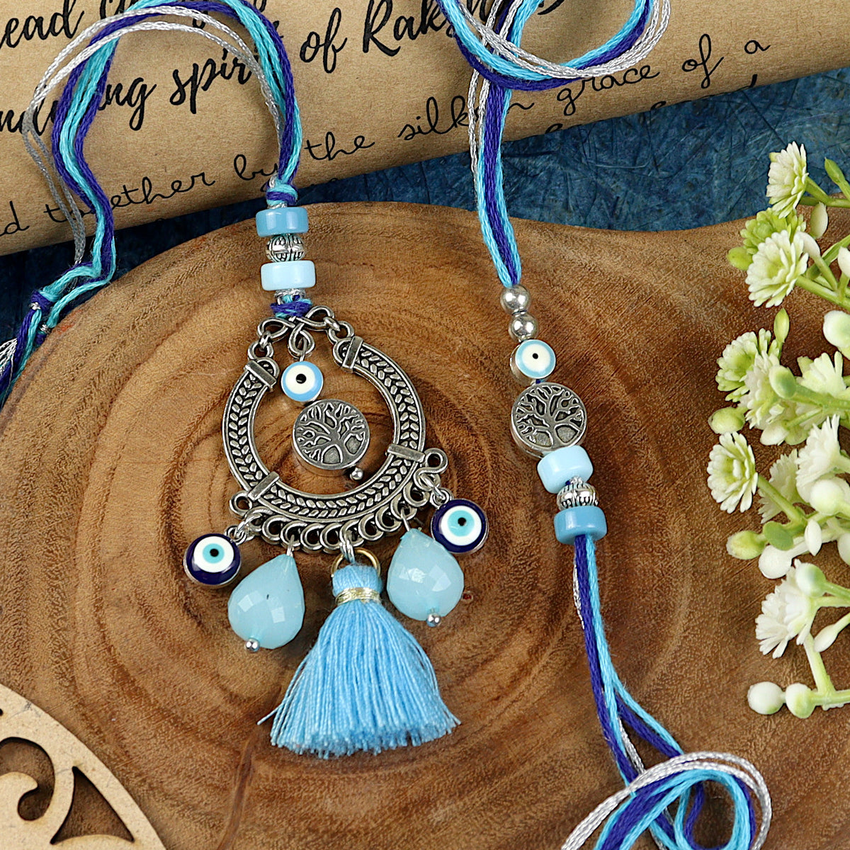 Evil Eye Bhai Bhabhi Rakhi pair — Rakhi and Lumba laid flat