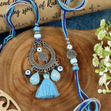 Evil Eye Bhai Bhabhi Rakhi pair — Rakhi and Lumba laid flat