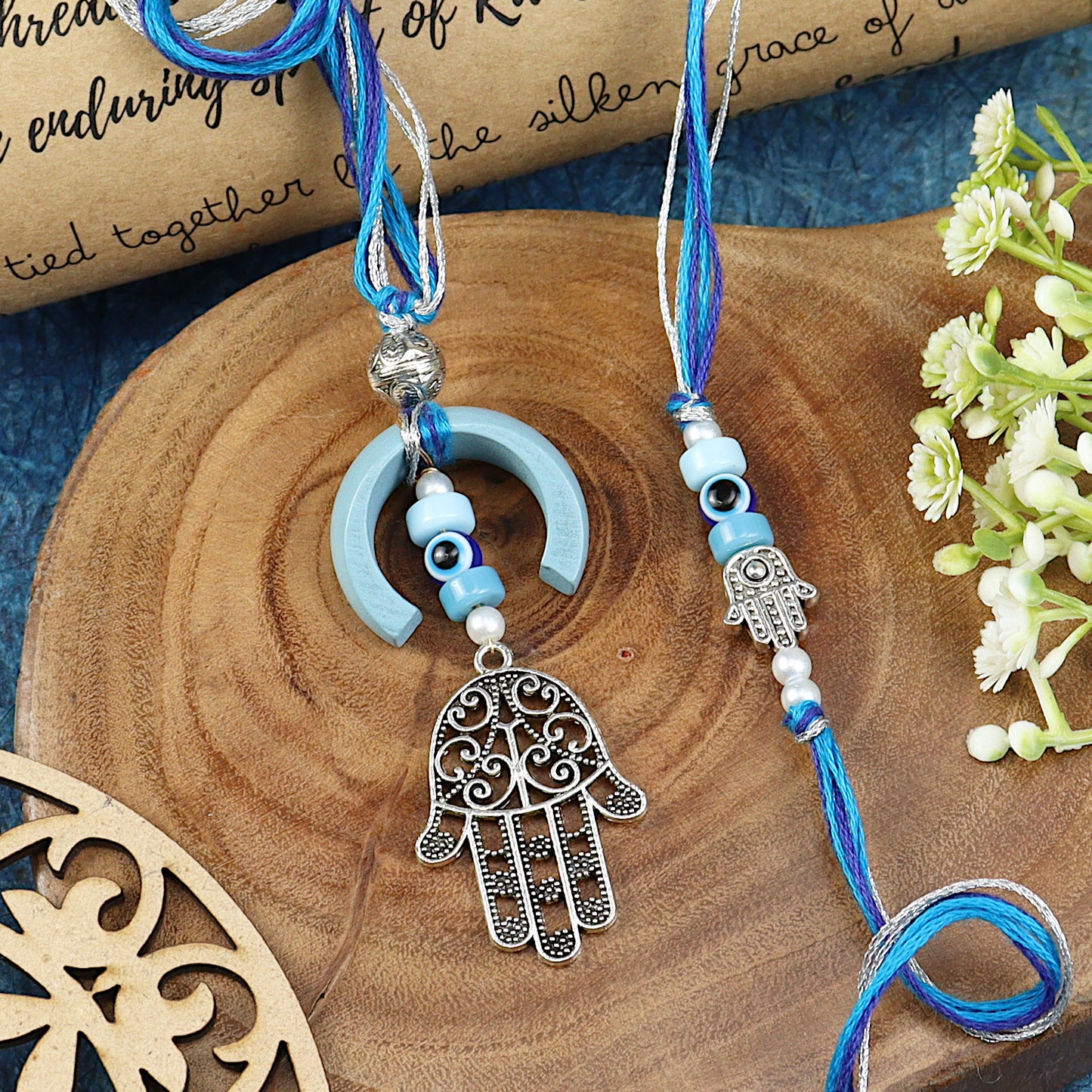 Hamsa Evil Eye Bhai Bhabhi Rakhi pair — Rakhi and Lumba laid flat
