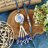 Evil Eye Tassels Bhai Bhabhi Rakhi pair — Rakhi and Lumba laid flat