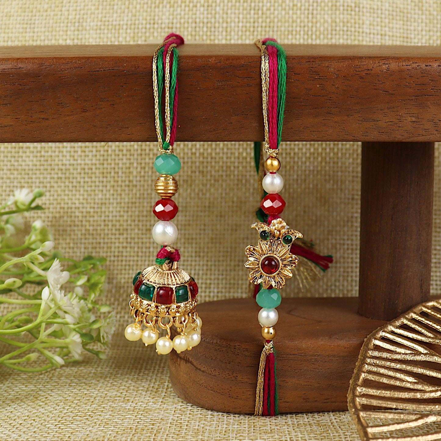 Jhumka Bhai Bhabhi Rakhi pair — Rakhi and Lumba laid flat