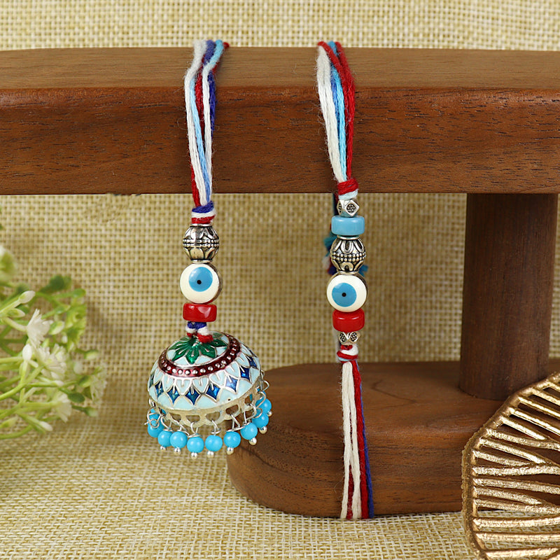 Evil Eye Jhumka Bhai Bhabhi Rakhi pair — Rakhi and Lumba laid flat