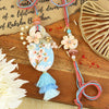 Floral Printed Motif Bhai Bhabhi Rakhi pair — Rakhi and Lumba laid flat