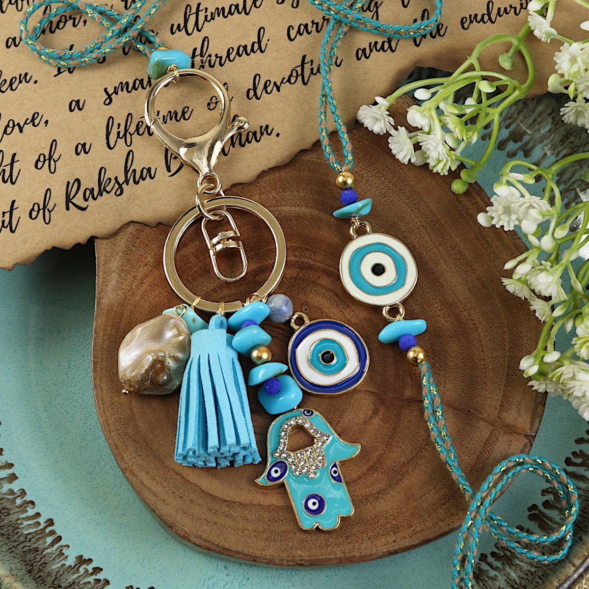 Hamsa Evil Eye Bag Charm Bhai Bhabhi Rakhi pair — Rakhi and Lumba laid flat