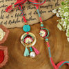 Lotus Enamel Turquoise Stone Bhai Bhabhi Rakhi pair — Rakhi and Lumba laid flat