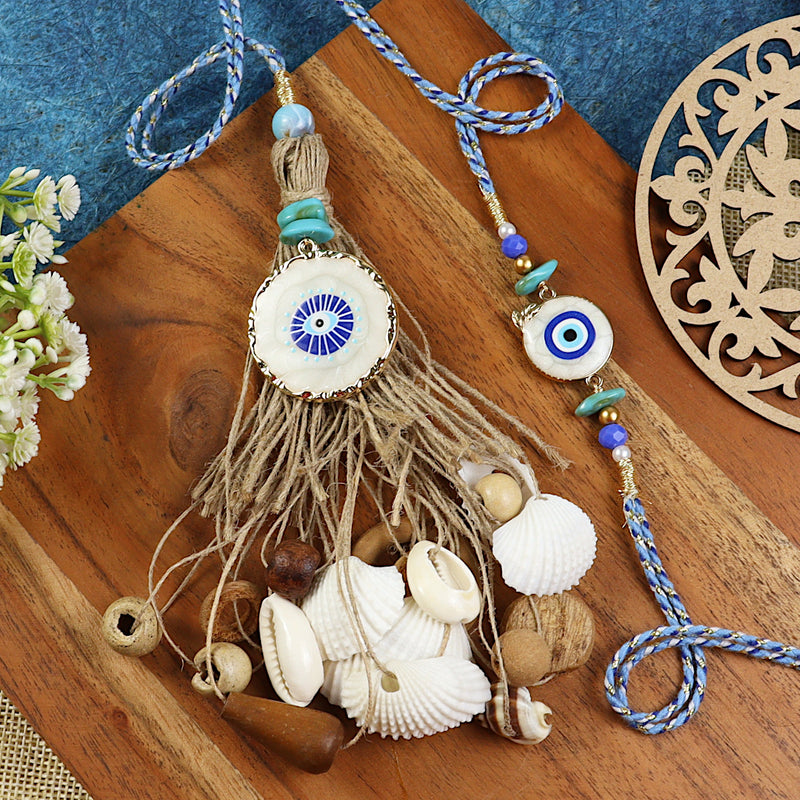 Evil Eye Jute Tassels Shell Bhai Bhabhi Rakhi pair — Rakhi and Lumba laid flat