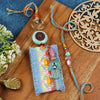 Hand Embroidered Lace Bhai Bhabhi Rakhi pair — Rakhi and Lumba laid flat