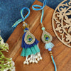 Jewelled Teardrop Peacock Motif Tassels Bhai Bhabhi Rakhi pair — Rakhi and Lumba laid flat