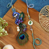 Hand Embroidered Peacock Bhai Bhabhi Rakhi pair — Rakhi and Lumba laid flat
