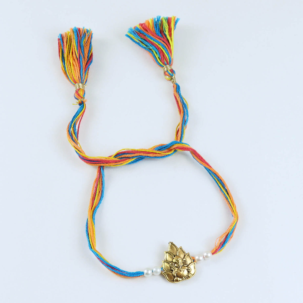 Ganesha Rakhi with Fancy Tassels