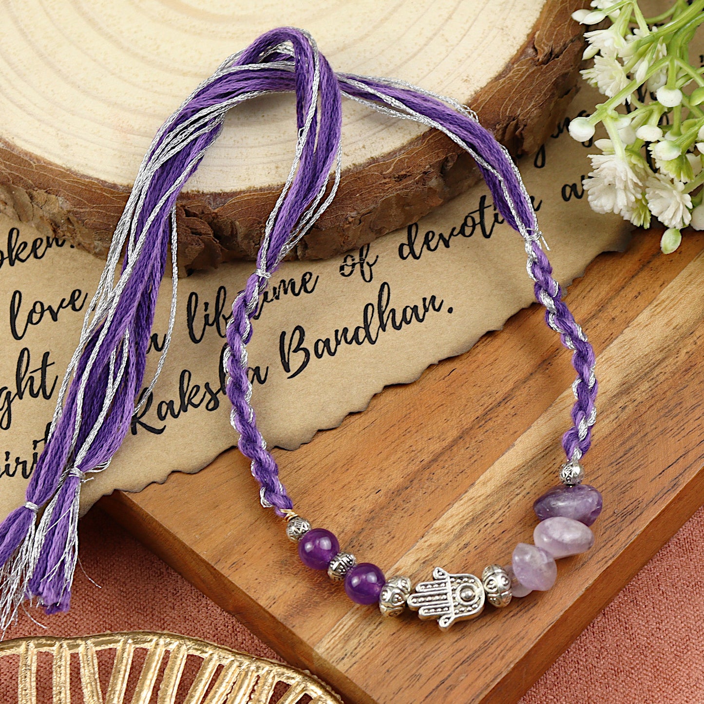 Amethyst Hamsa Rakhi in amethyst, laid flat