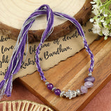 Amethyst Hamsa Rakhi in amethyst, laid flat