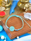 Evil Eye bracelet Rakhi with Evil Eye charm on an adjustable drawstring cord