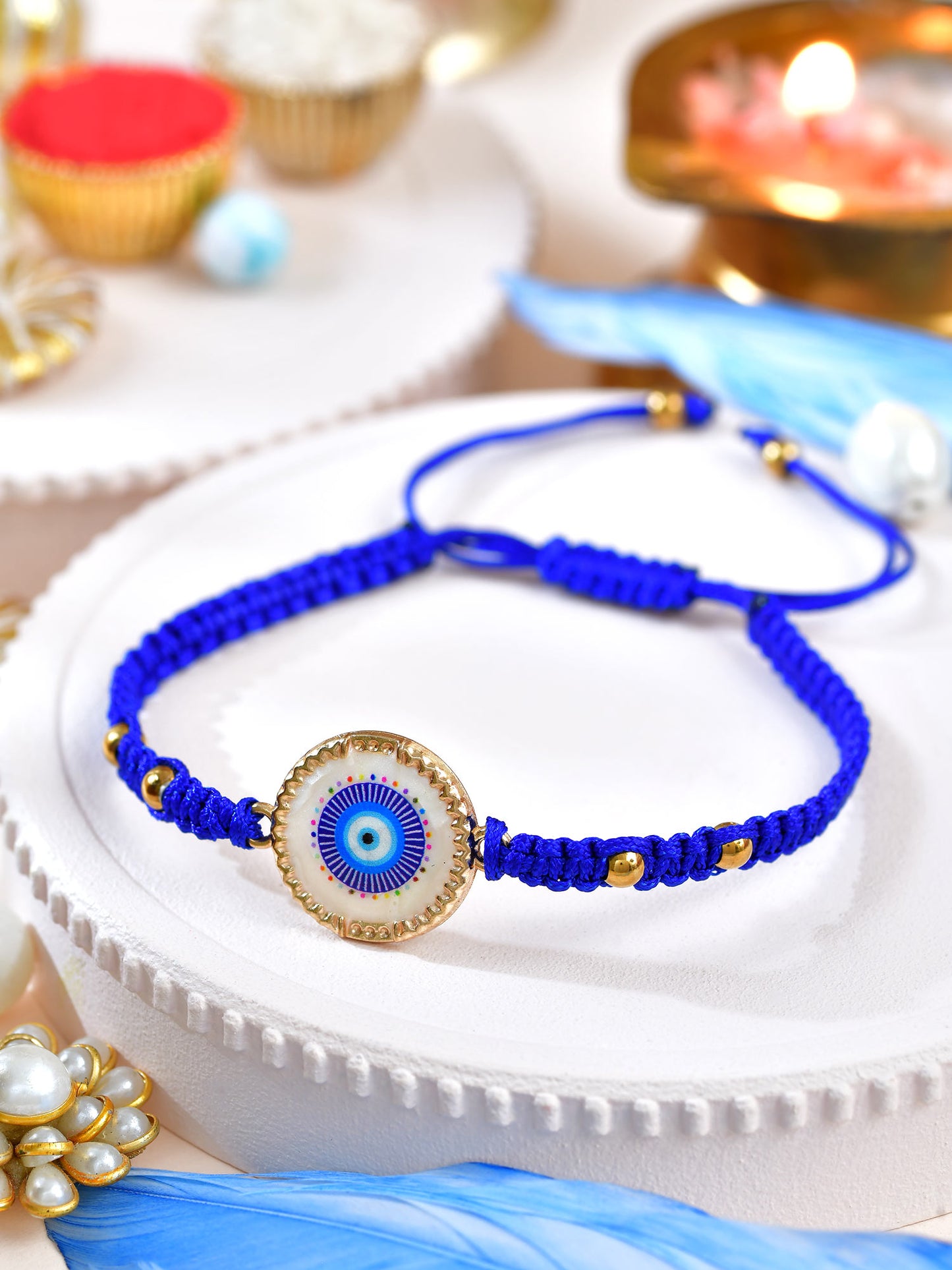 Evil Eye drawstring bracelet Rakhi with Evil Eye charm on a drawstring cord