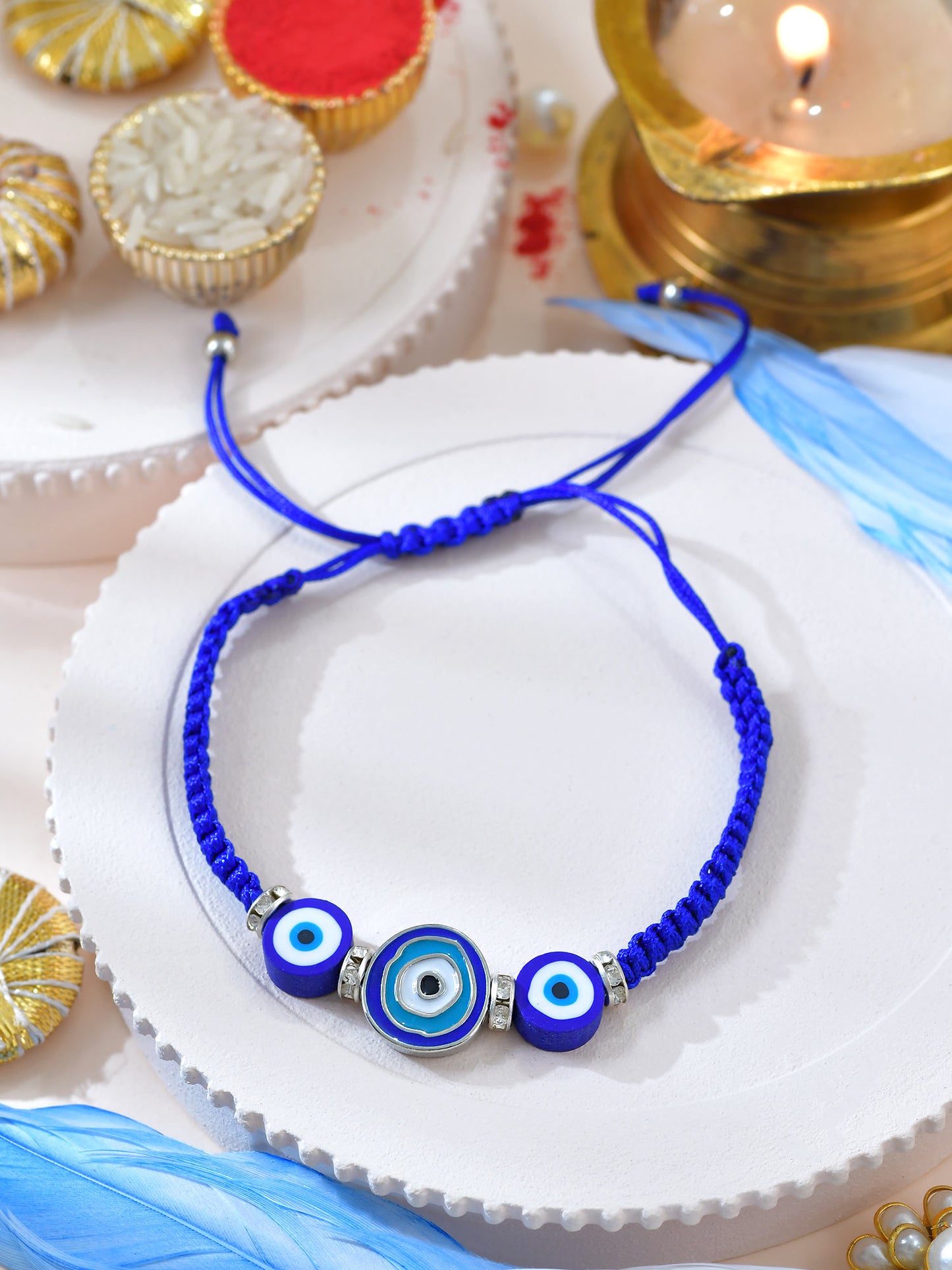 Evil Eye adjustable bracelet Rakhi with Evil Eye charm on a drawstring cord