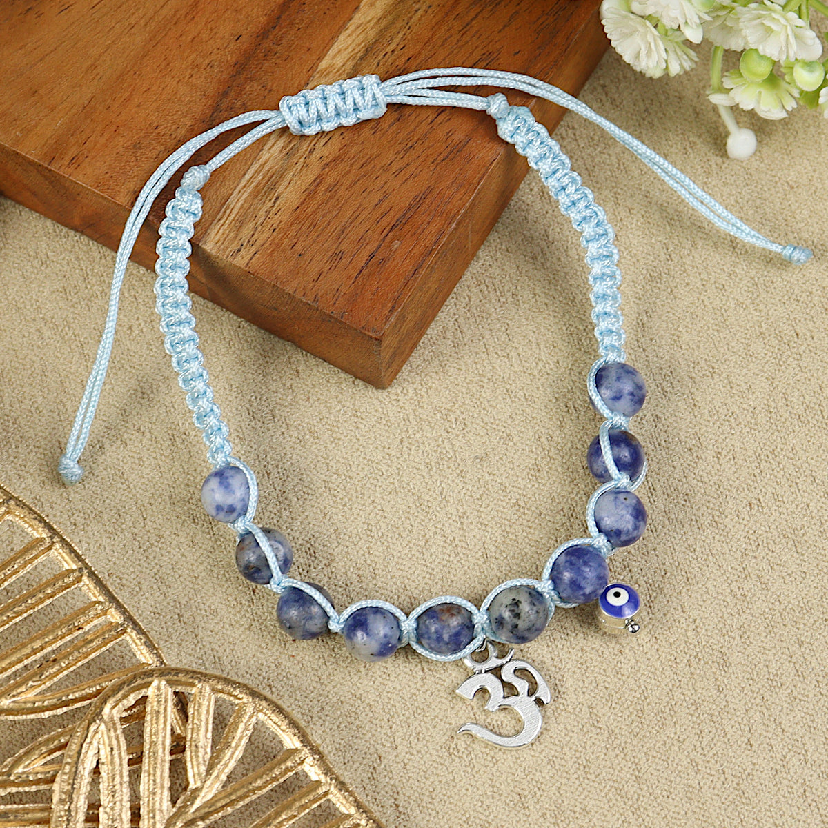 Lapis Lazuli Beaded Bracelet Rakhi, laid flat