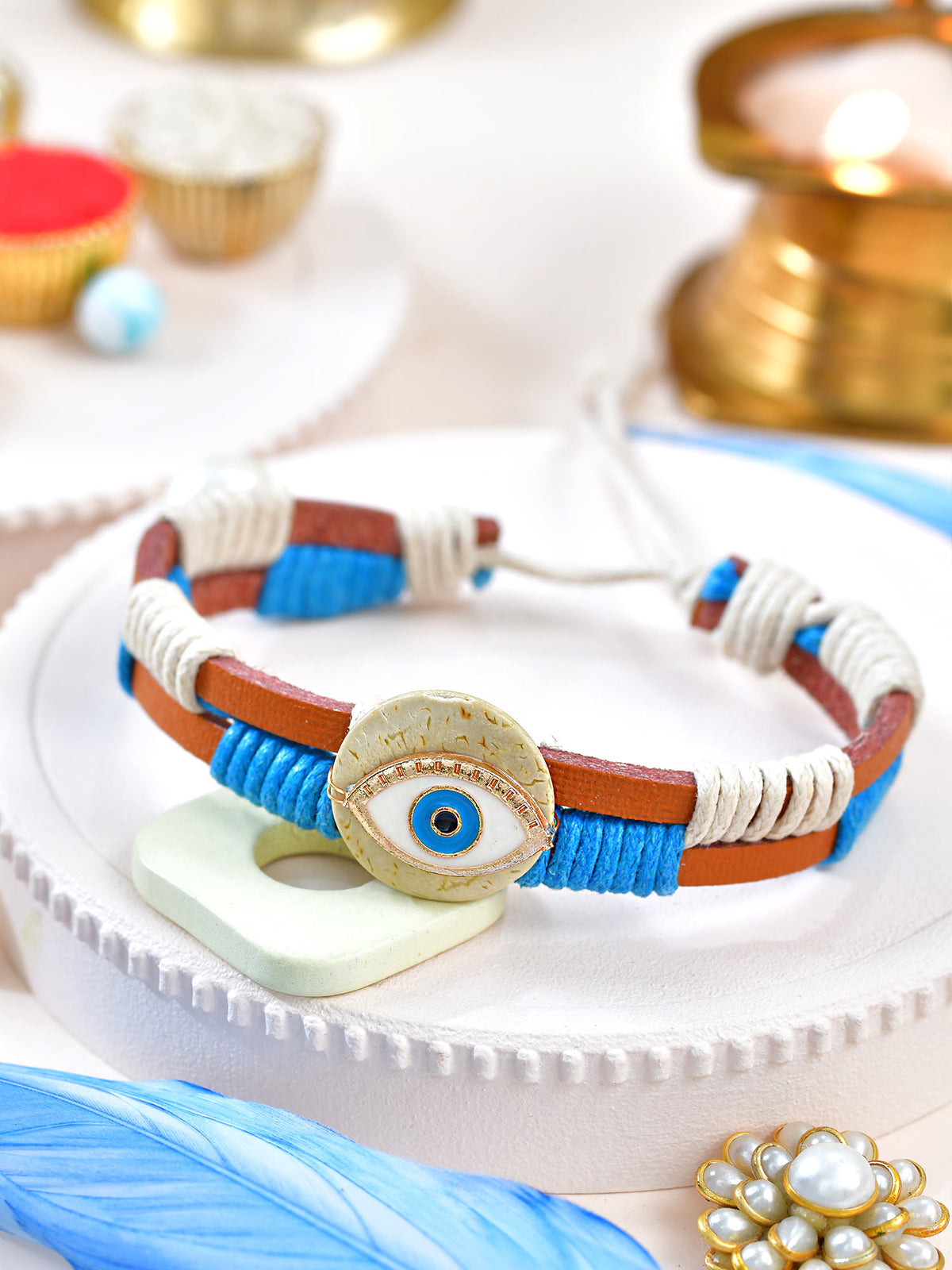 Evil Eye leather band Rakhi with Evil Eye charm on a leather drawstring cord