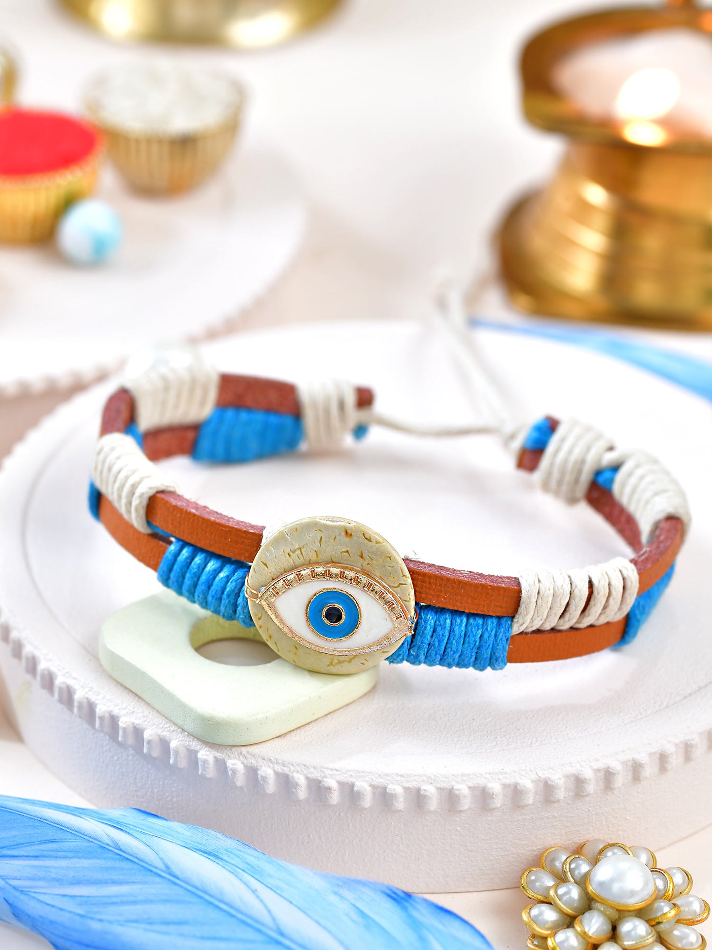 Evil Eye leather band Rakhi with Evil Eye charm on a leather drawstring cord