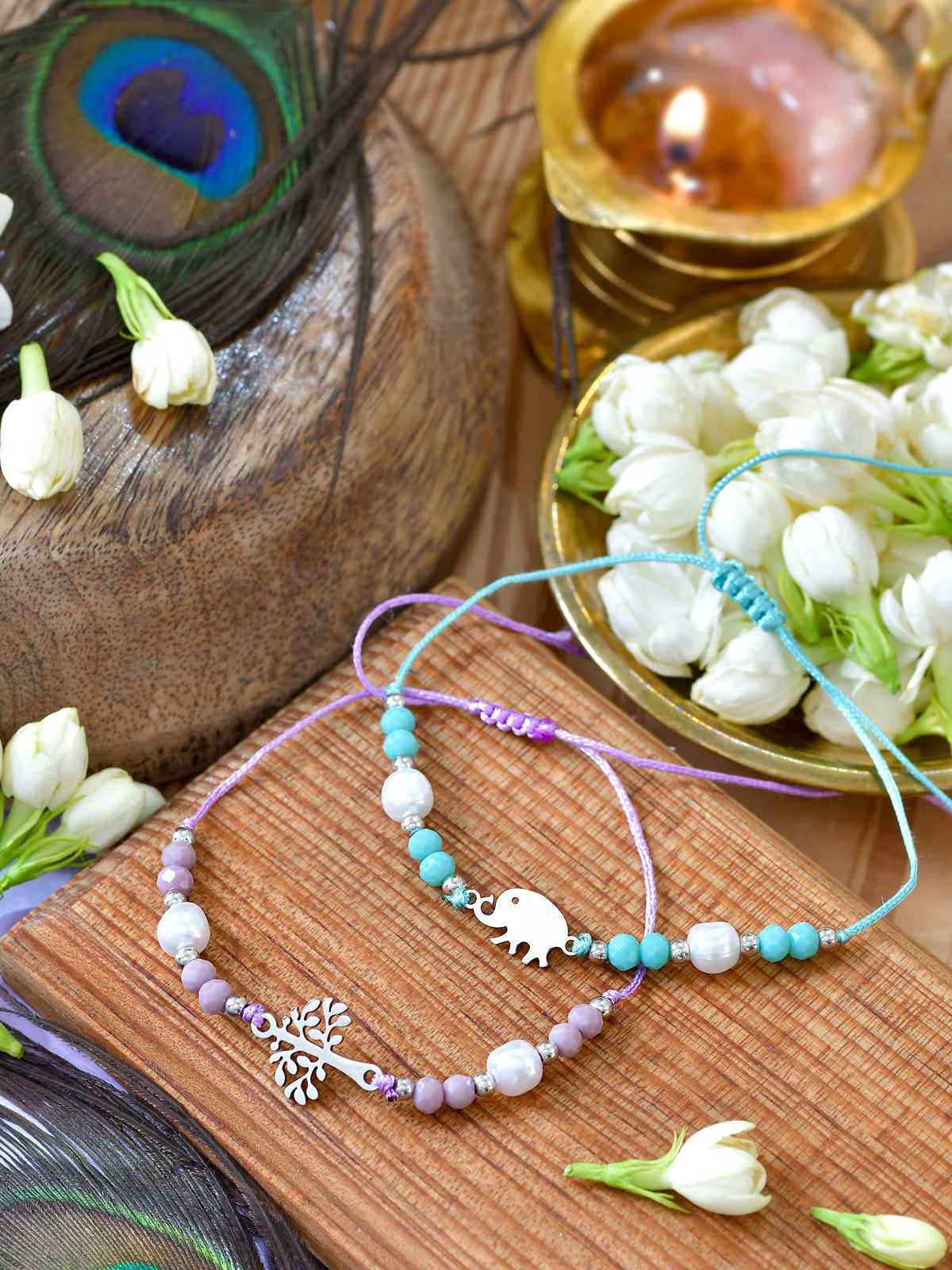 Elephant Hamsa Evil Eye Bracelet Rakhis duo on a surface