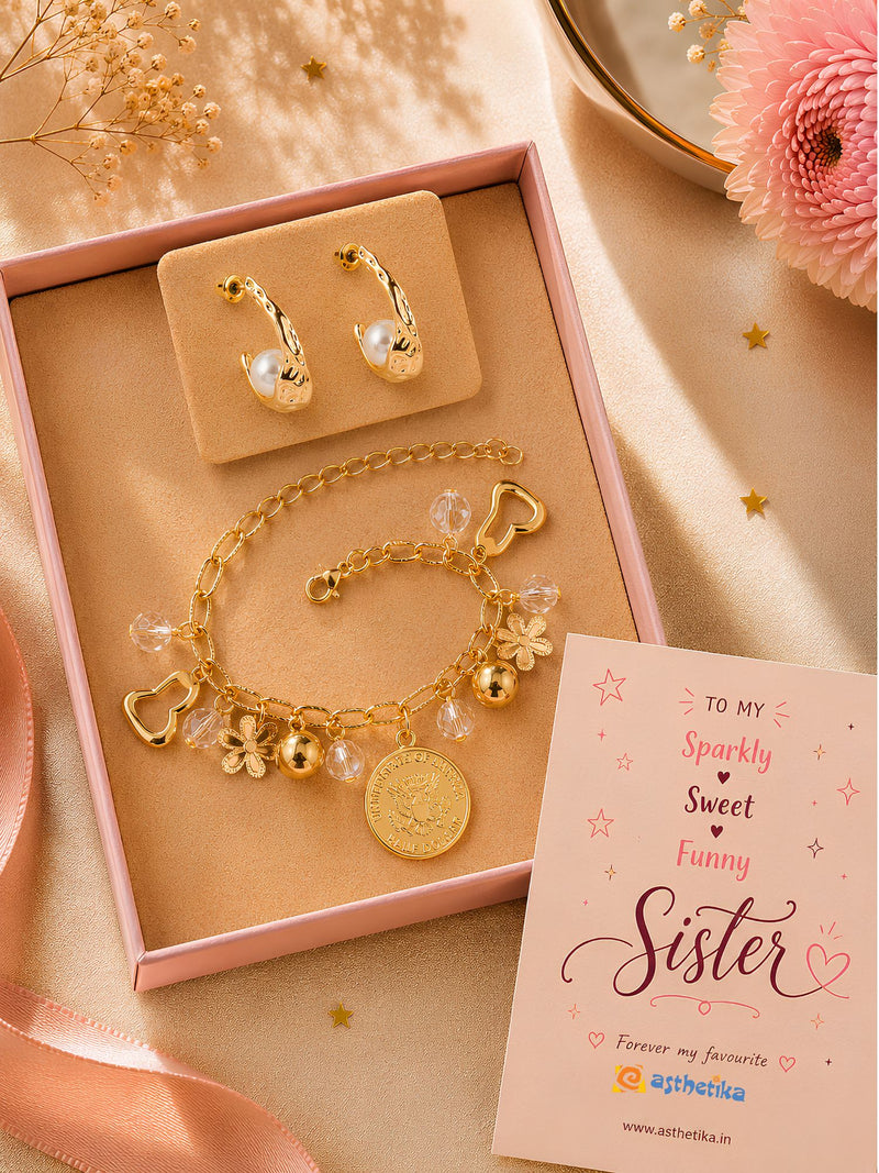 Pearls and hanging charms bracelet and earrings set, laid flat