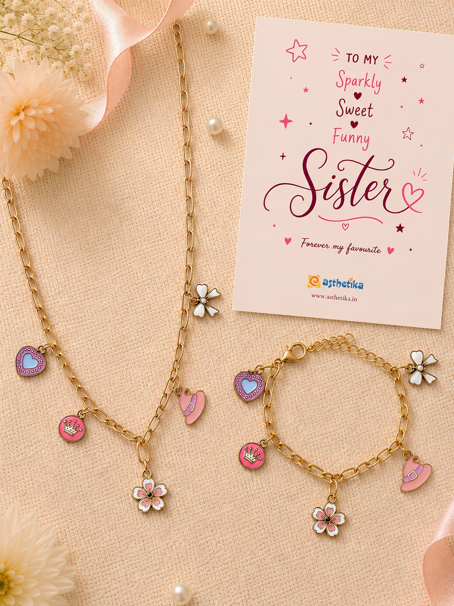Multi charm necklace and bracelet set, laid flat