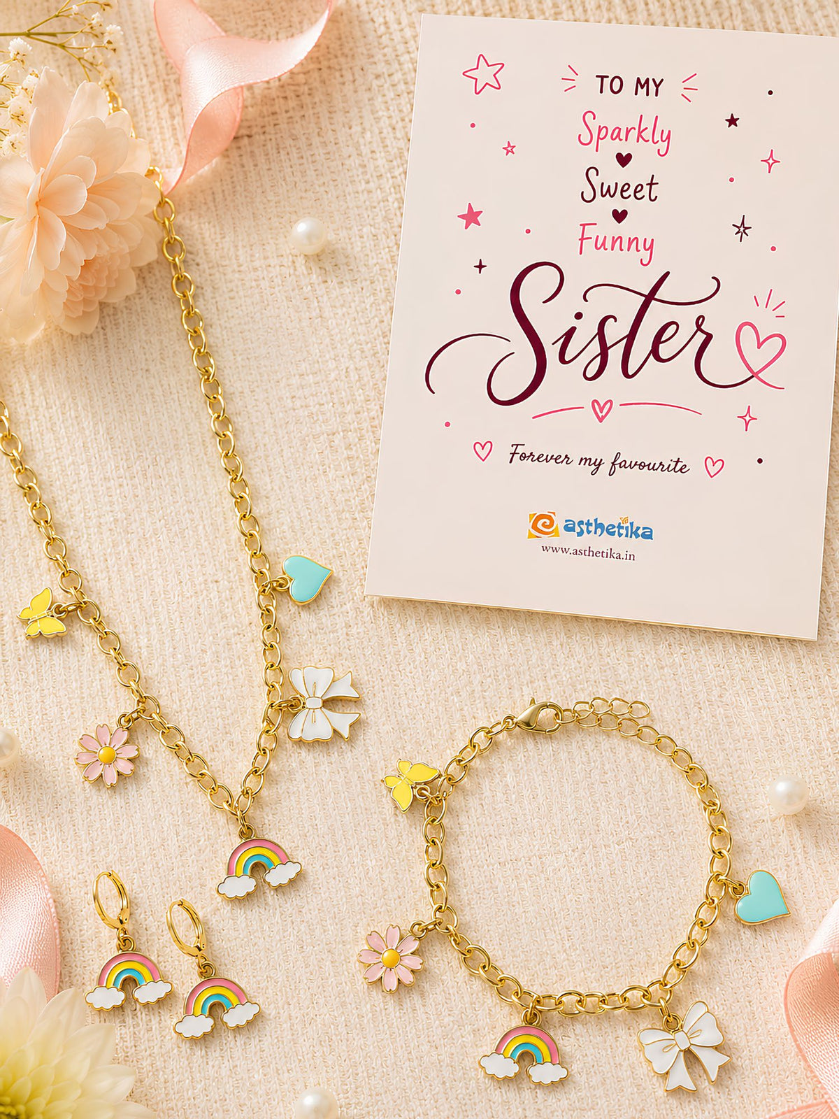 Multi charm bracelet and necklace set, laid flat