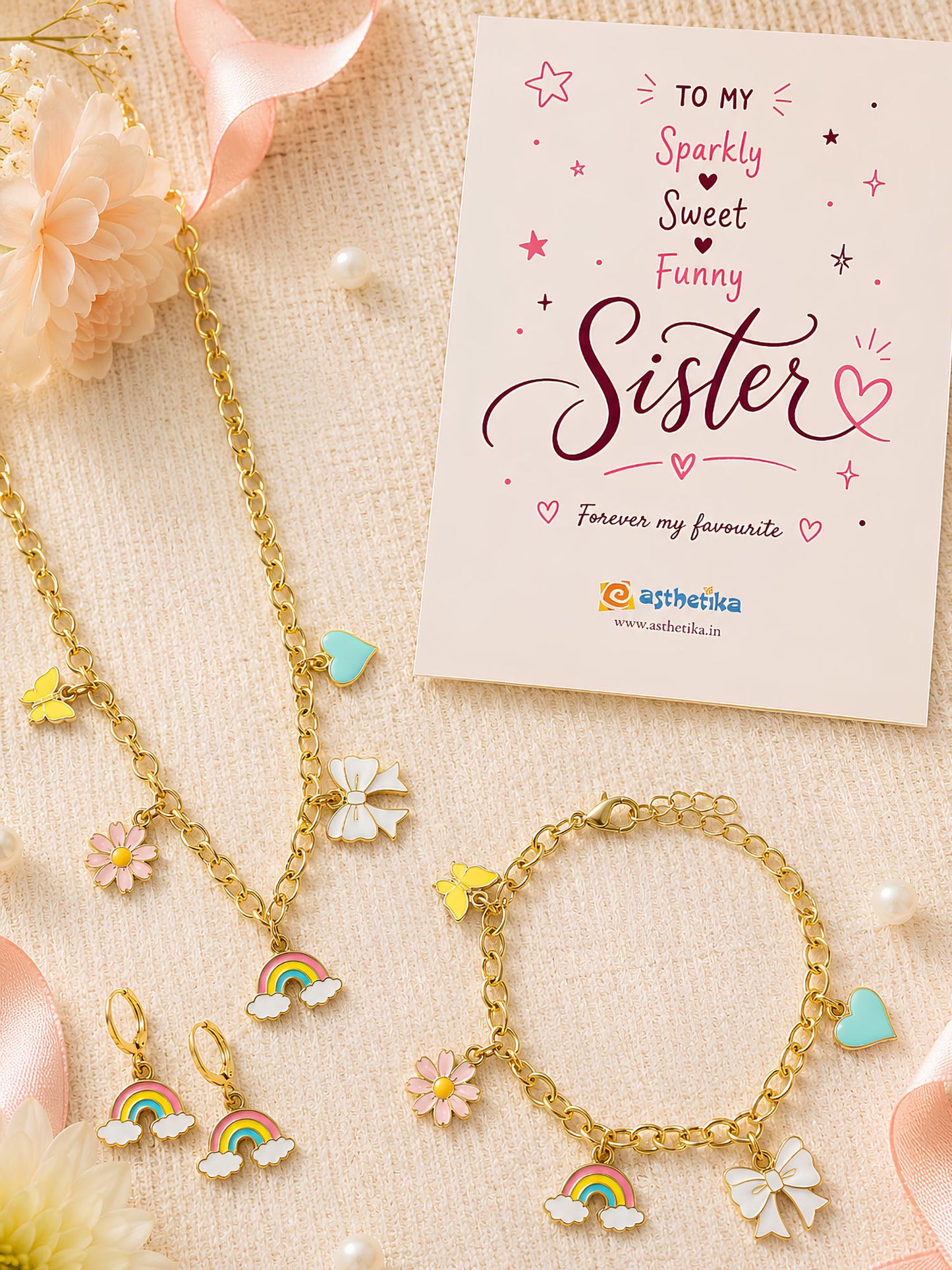 Multi charm bracelet and necklace set, laid flat