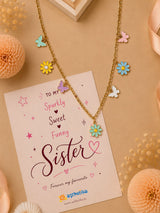 Charm floral necklace, laid flat