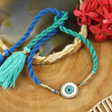 Enamel Evil Eye Tassel Rakhi, laid flat