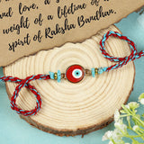 Red Stone Evil Eye Rakhi, laid flat