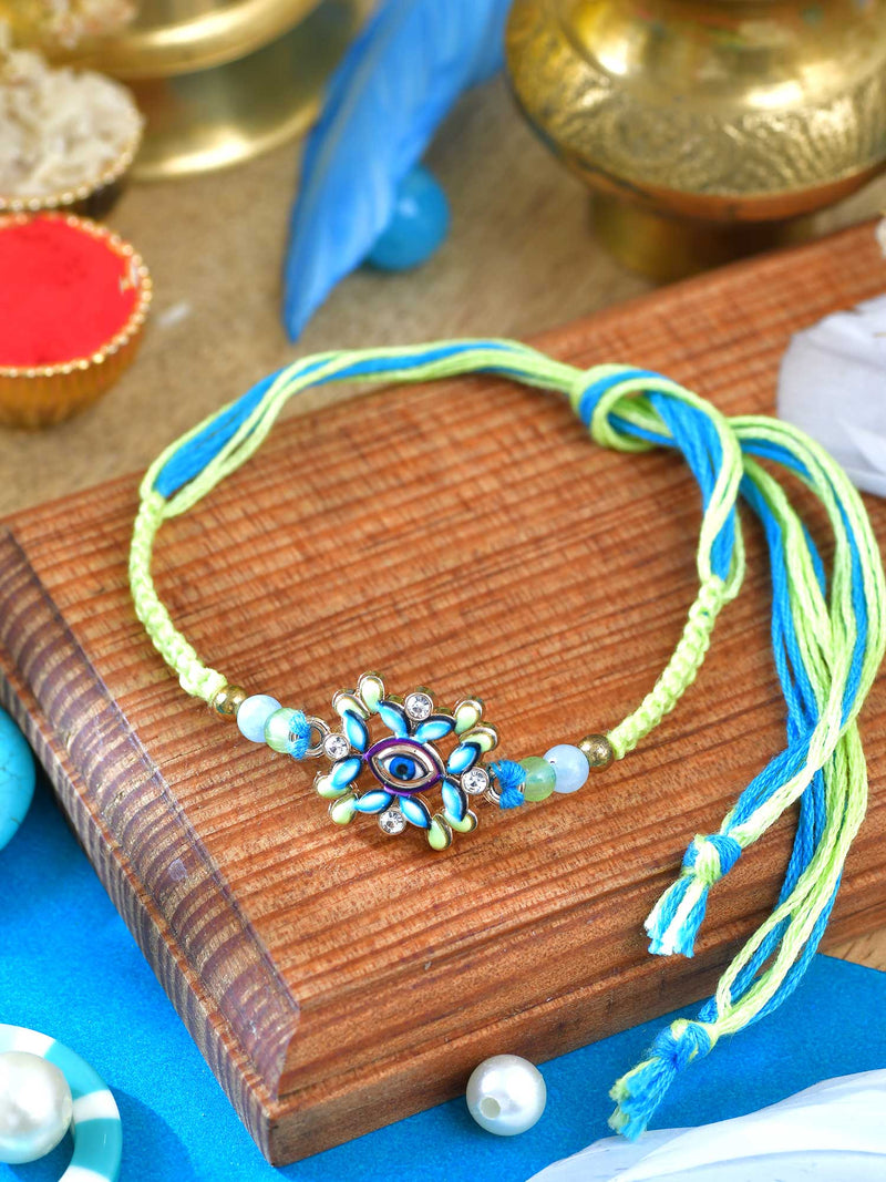 Evil Eye Minakari Rakhi with Evil Eye charm and Minakari detailing on a thread cord