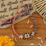 Blue Meena Ruby Rakhi, laid flat