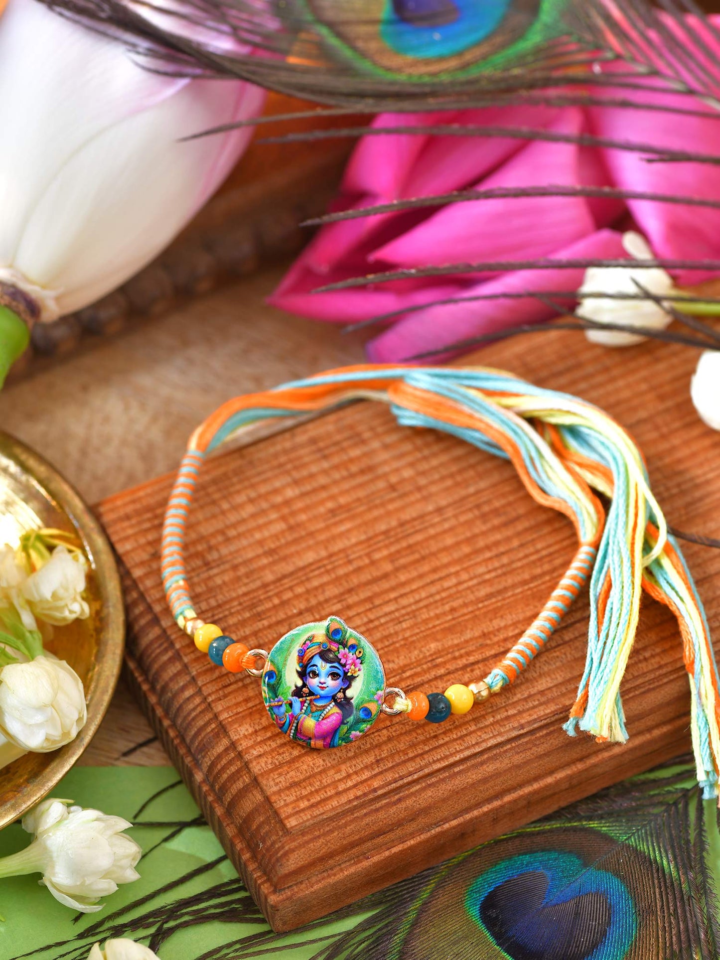 Krishna Rakhi with Krishna charm on a thread cord