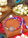 Om Minakari Rakhi with Om motif and Minakari stone finish on a thread cord